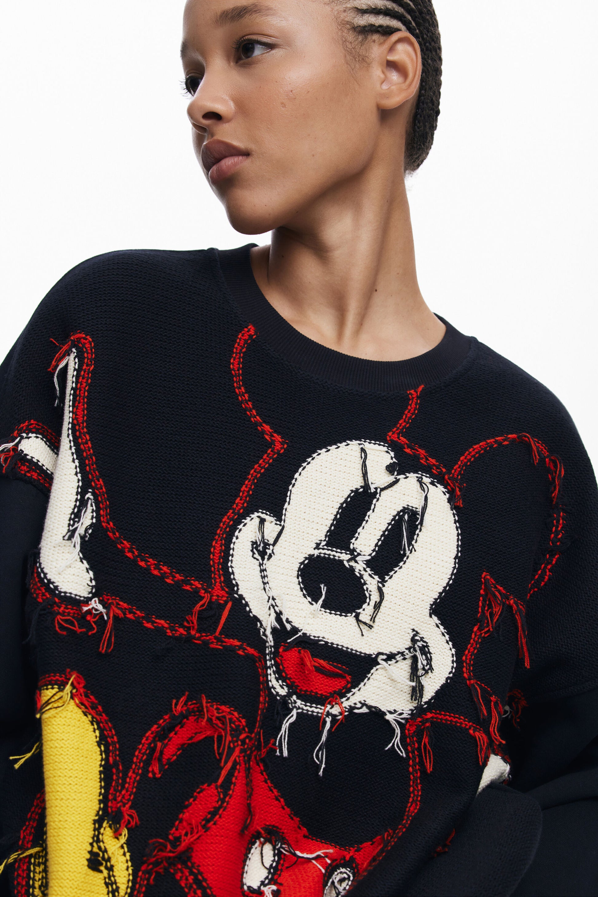 Suéter negro bordado Mickey Mouse Desigual